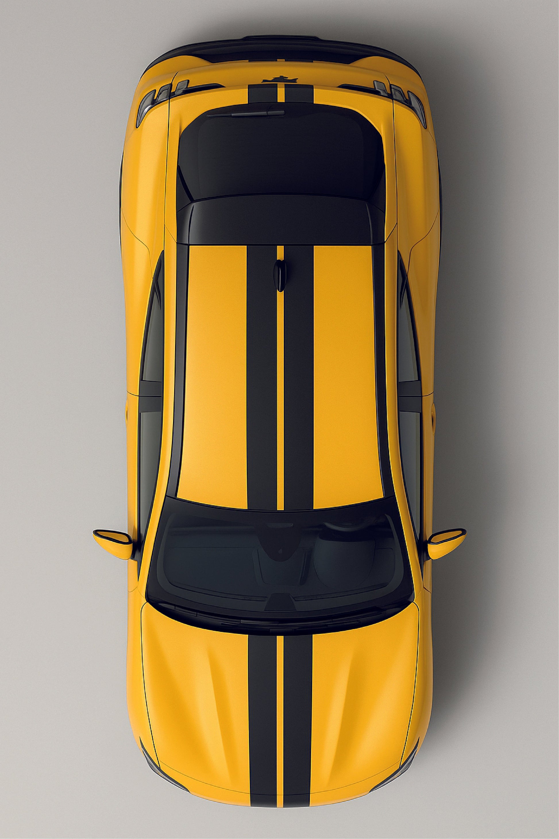 Yellow car with black roof on a gray background