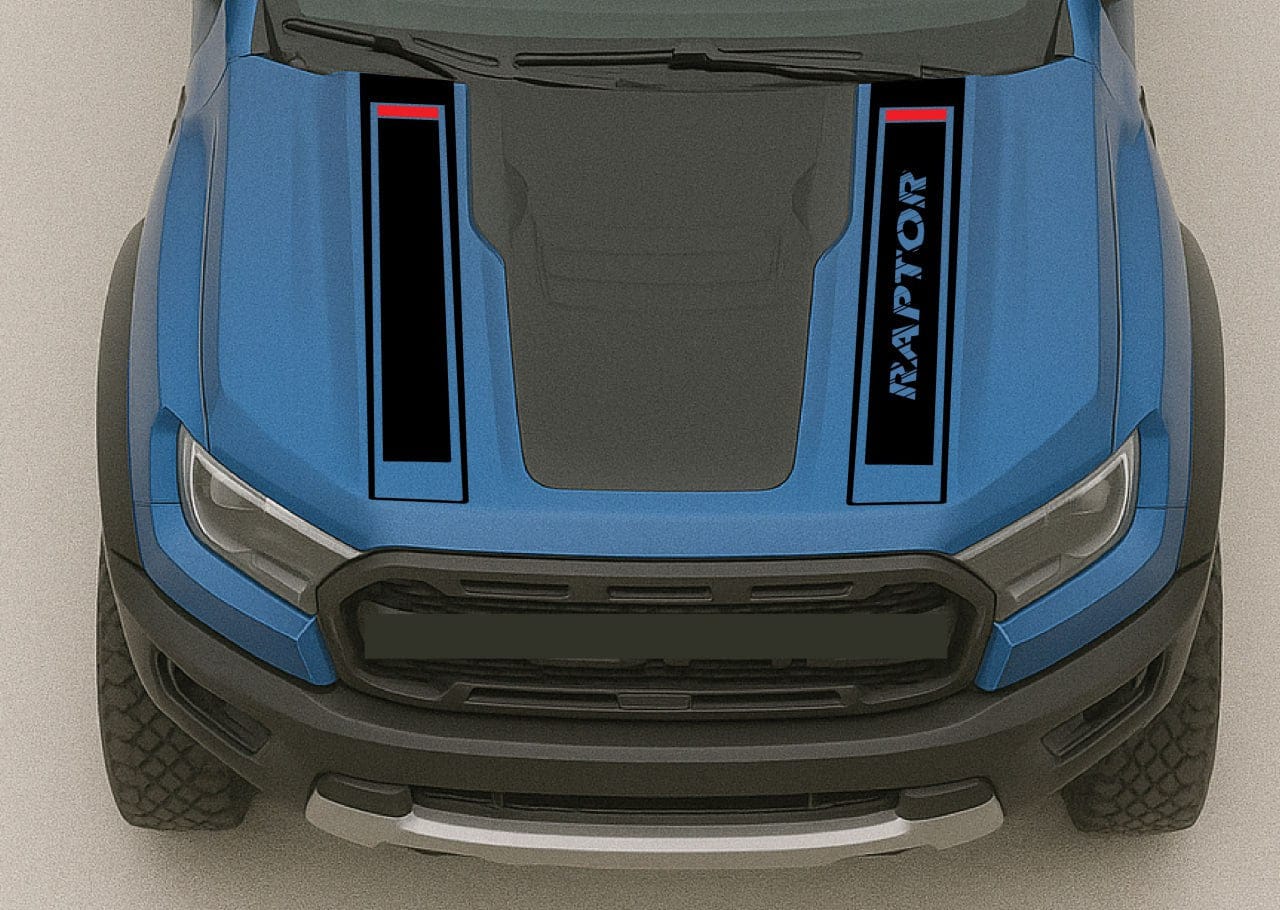 Close-up of a blue and black vehicle with 'Raptor' branding on a gray background