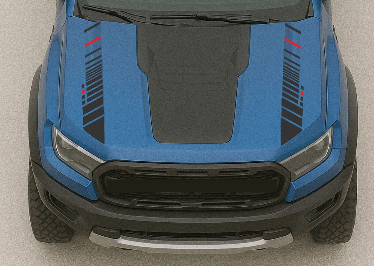 Close-up of a blue and black vehicle hood with a gray grille on a light gray background