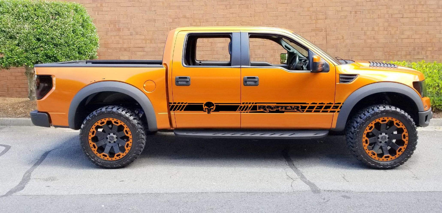 An orange and black Ford F-150 Raptor SVT truck with vinyl side racing stripes.