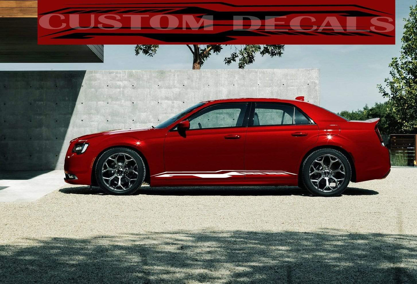 A red Chrysler 300 car parked outdoors with a custom decal on its side, showcasing the brand's logo and the text 'Chrysler 300'.