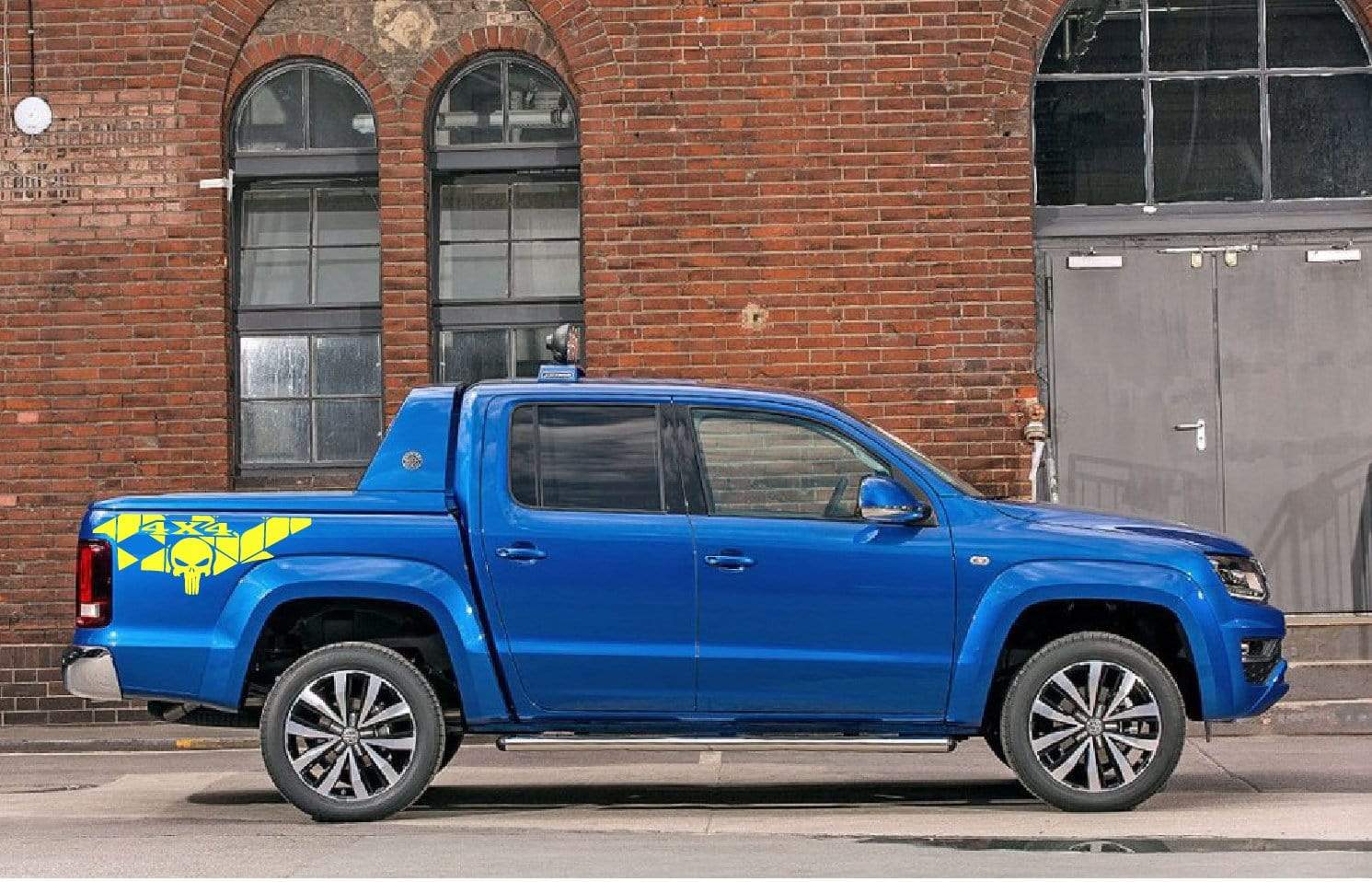 A truck with a custom rear decal design, showcasing the graphics that can be applied to the vehicle.